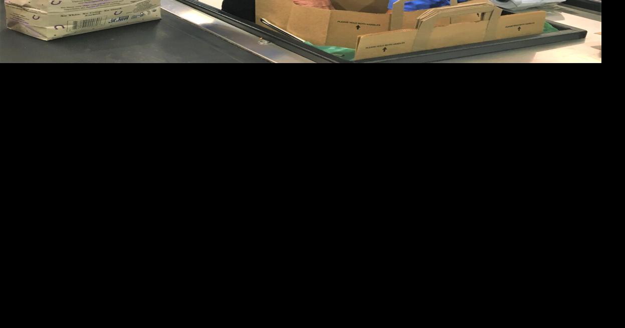 Service with a smile at Daniels Foods in Walworth with cashier Margaret