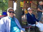 Ken Dues and Kenda Dues of Racine relax at Juneteenth event in Burlington