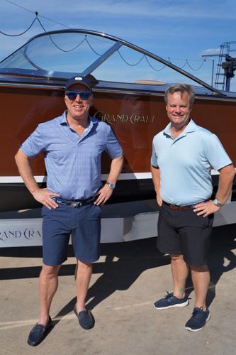Gage Marine owner Bill Gage, Jr. and Grand Crafts Boats, LLC president and CEO Patrick Gallagher