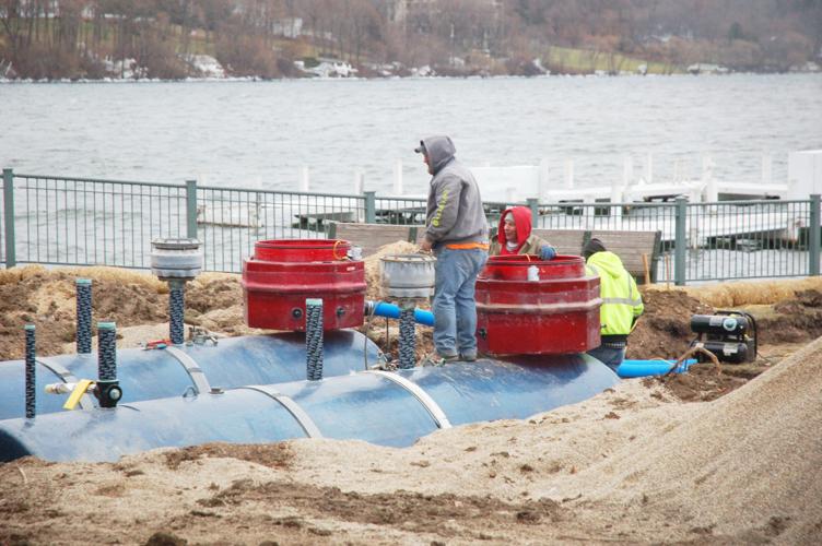Workers installing new underground fuel tanks Riviera Lake Geneva