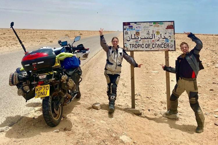 Pair traveled world on a motorcycle. They just set a record