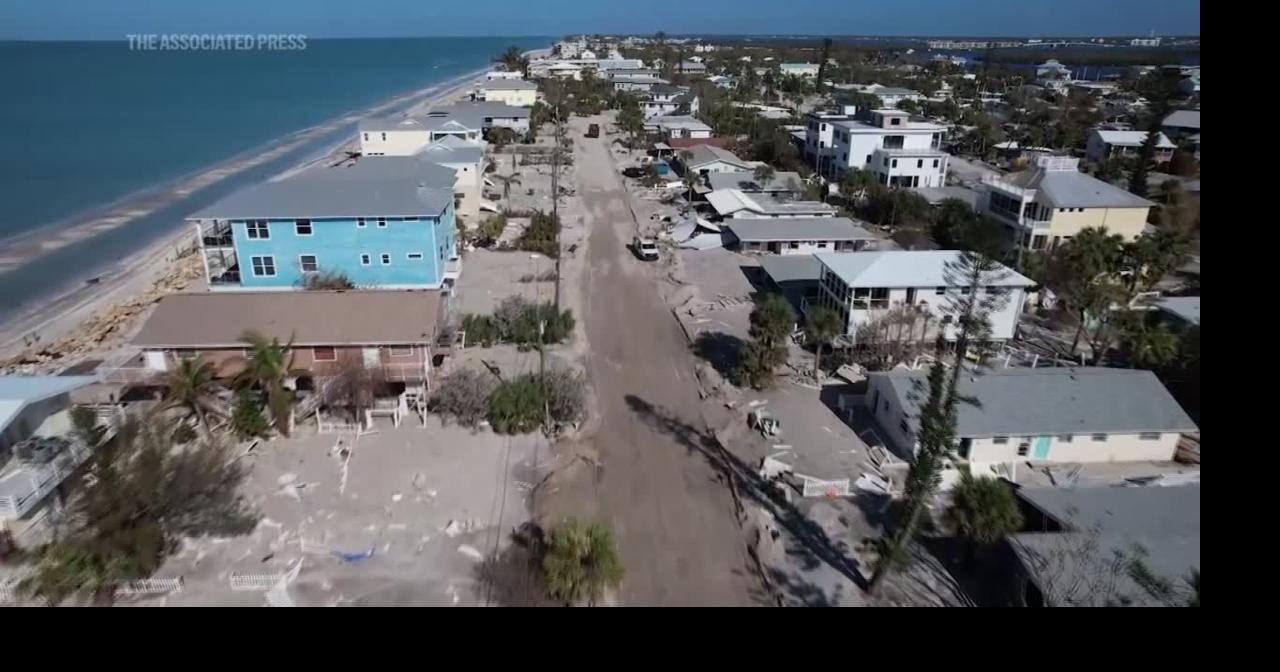 Florida digs out of mountains of sand swept in by backtoback hurricanes