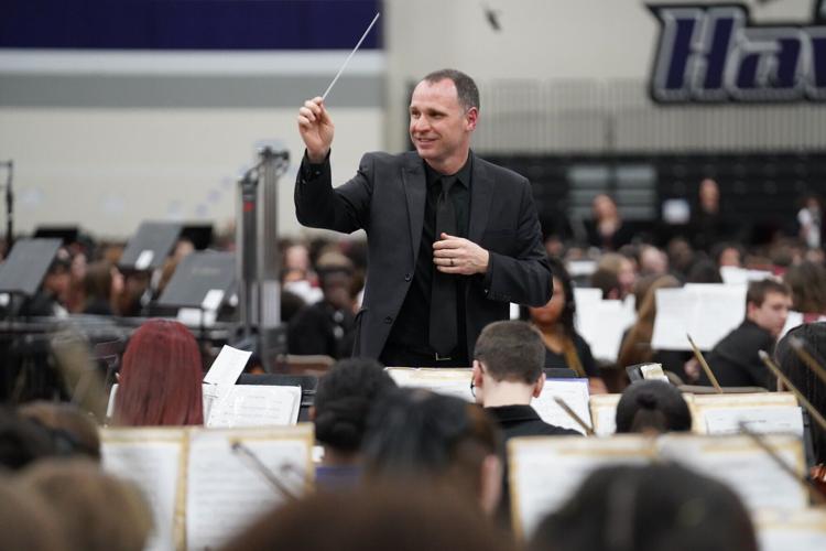 James Mick conducts KUSD orchestra students during annual festival
