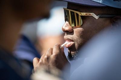 Milwaukee Brewers outfielder Luis Lara listens to a conversation among teammates during spring training workouts Tuesday, February 17, 2026, at American Family Fields of Phoenix in Phoenix, Arizona.