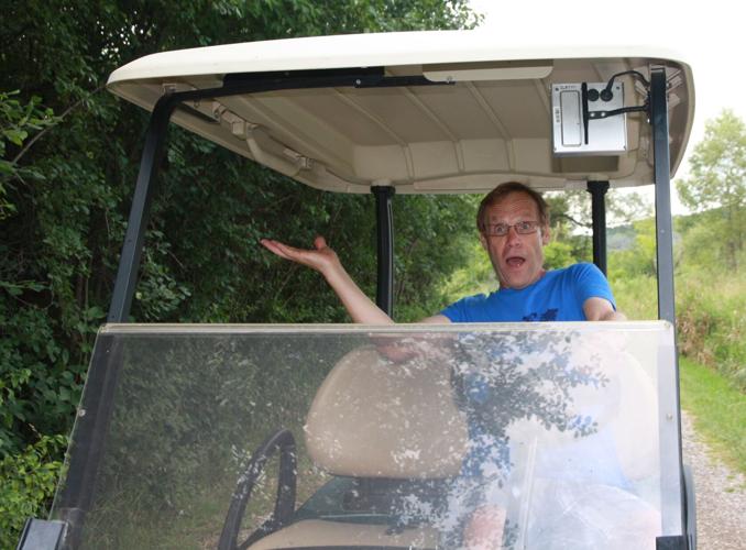 Pastor Brian Metke on golf cart