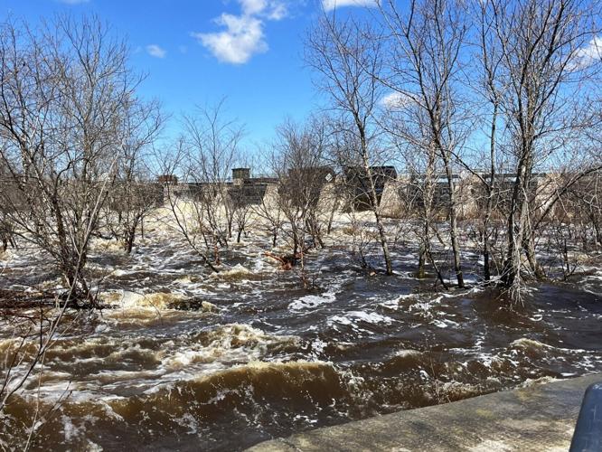 Water from the Wisconsin River flows through the dam near Legion Park as seen April 16, 2026 in Wisconsin Rapids.