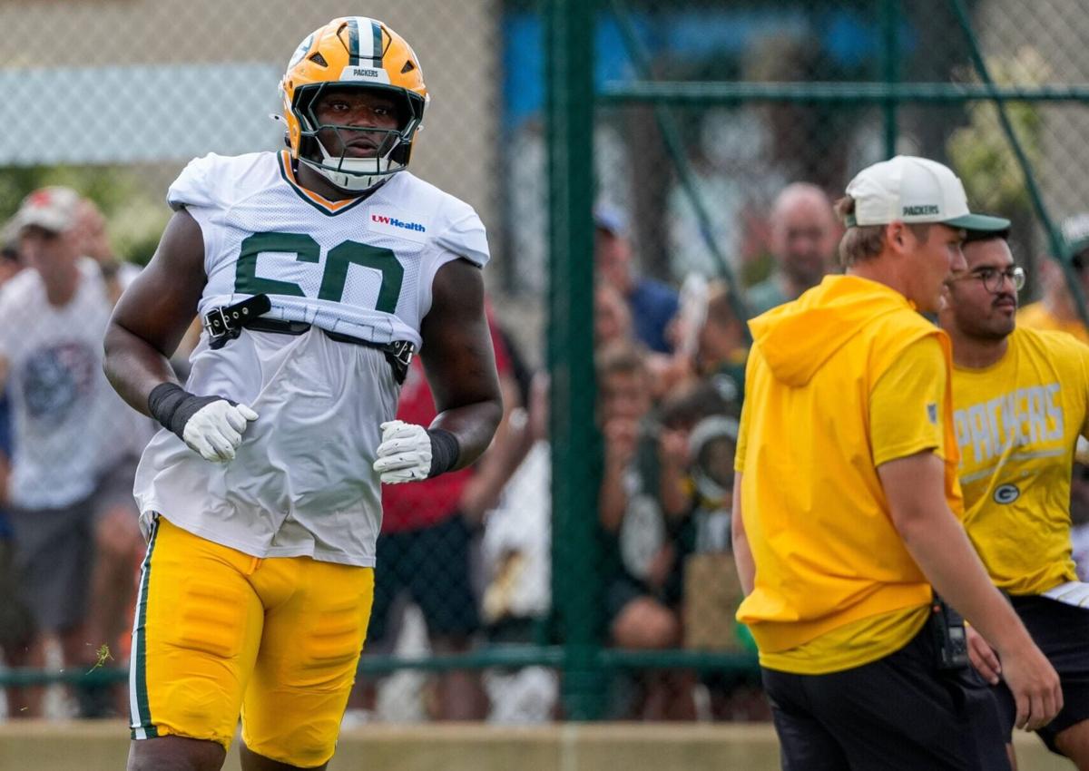 Green Bay Packers defensive lineman Anthony Campbell (60) runs through a drill during a joint practice with the Arizona