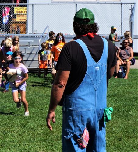 Walworth County Fair: Seven-year-old Penelope Stallings of Elkhorn is off to the Kiddieland stick horse races