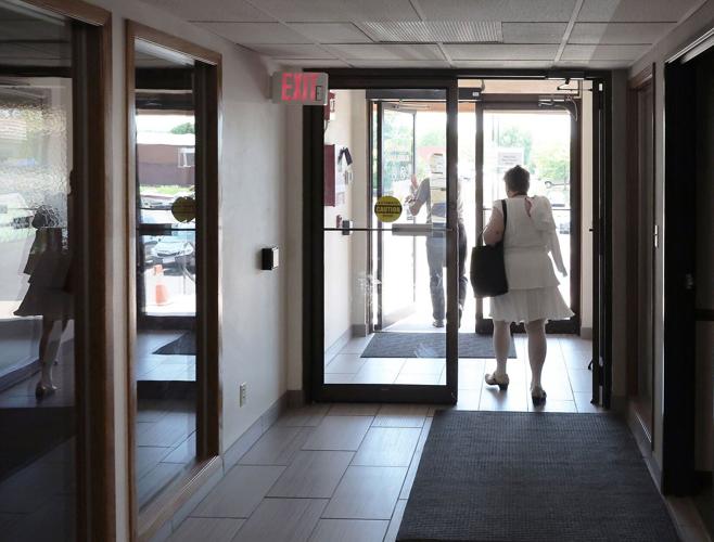 Arlene going through the door