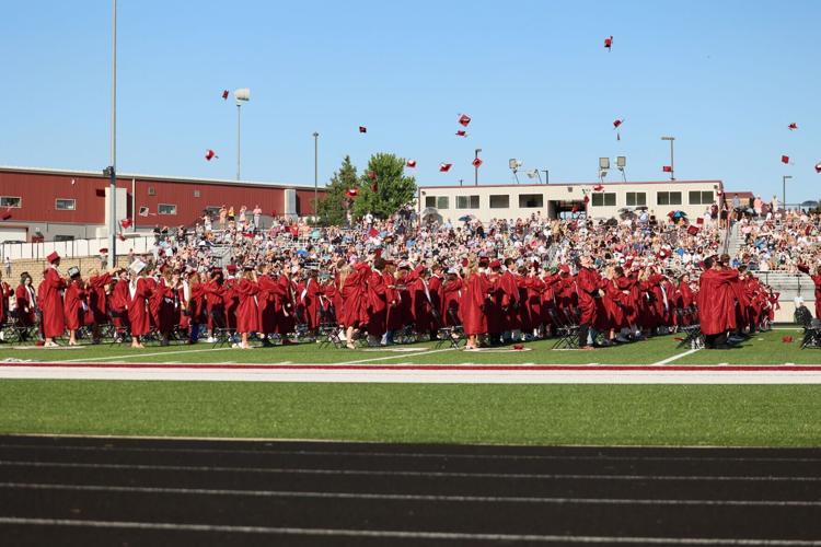 Westosha Central graduates throw caps