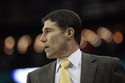 Coach Dino Gaudio of the Wake Forest Deacon Demons talks with his team during the second round of the 2010 NCAA men's basketball tournament at the New Orleans Arena on March 20, 2010 in New Orleans, Louisiana.