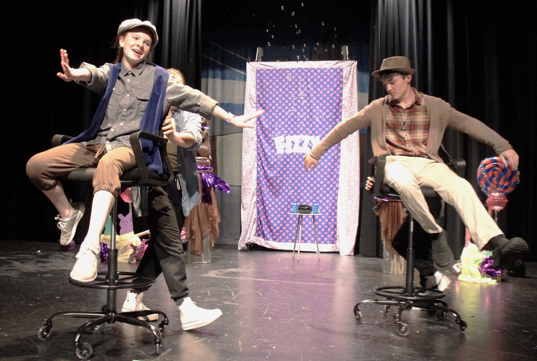 Charlie Bucket and Grandpa Joe flying in the Wonka factory after drinking Fizzy Lifting Drinks