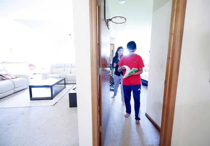 Ethan Robert studies for spelling bee at home in New Berlin