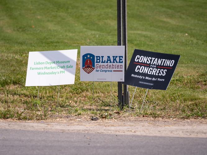 Blake Gendebien and Anthony Constantino signs can be seen at an intersection in Lisbon, NY.
