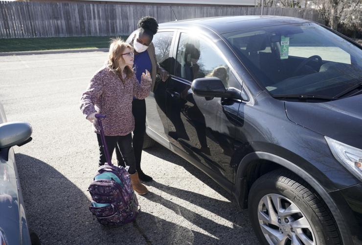 Erika and Teddy by car
