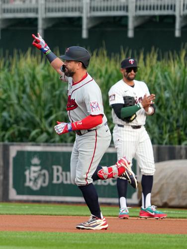 Philadelphia Phillies designated hitter Kyle Schwarber (12) rounds the bases after a home run during a baseball game between the