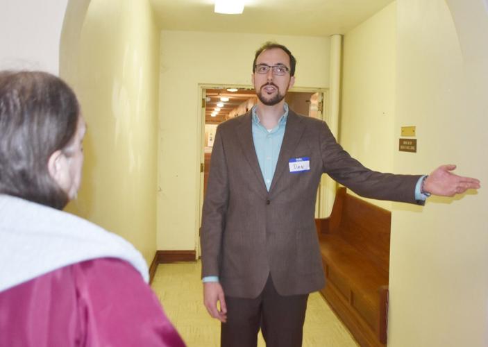 Dan Craig leads a tour inside the Sacred Heart Retreat Center in Burlington