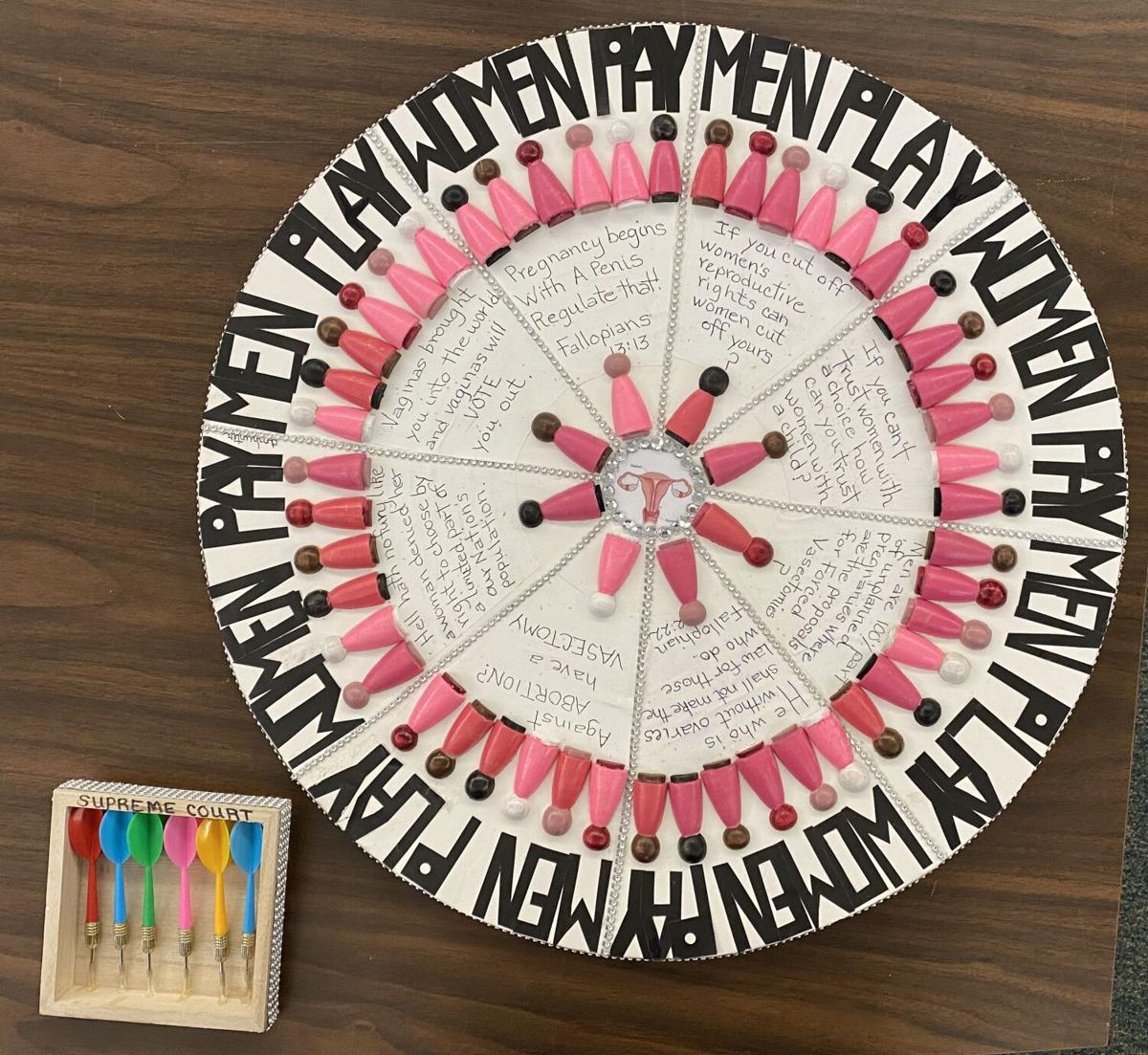 Dawn Hunter, "Women's Rights Targeted"