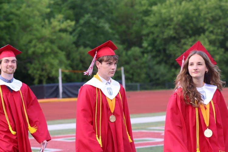 Three graduates