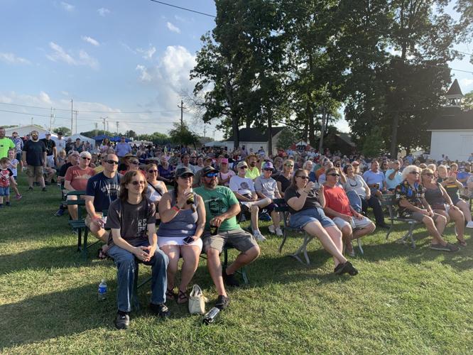 A crowd of people taken in the festivities