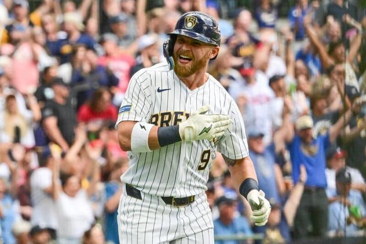 Aug 22, 2026; Milwaukee, Wisconsin, USA;  Milwaukee Brewers right fielder Jake Bauers (9) reacts after hitting a two run home run in the third inning against the Atlanta Braves at American Family Field.  Mandatory Credit: Benny Sieu-Imagn Images