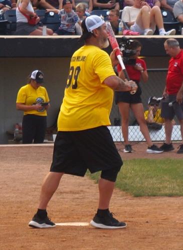Chicago Cubs pitcher Mitch "Wild Thing" WIlliams looks to bunt his way onto the basepaths July 15 at the inaugural Legends Celebrity Softball Game at Rockford Rivets Stadium