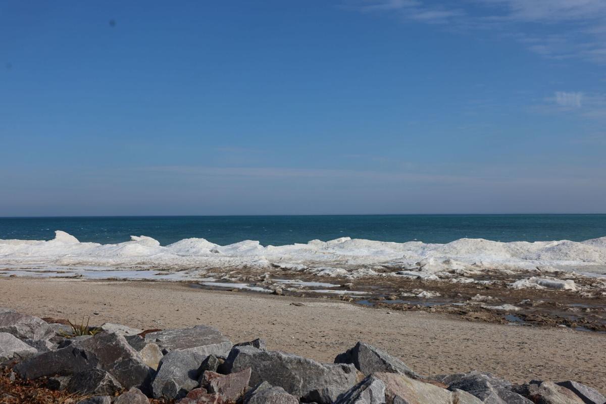 Snow melts on the Wind Point lakeshore during mid-February warm-up