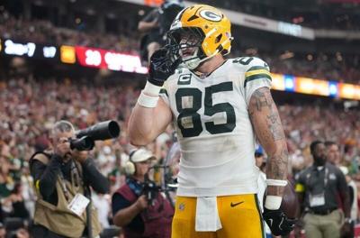 Green Bay Packers tight end Tucker Kraft (85) celebrates his touchdown catch against the Arizona Cardinals at State Farm Stadium in Glendale on Oct. 19, 2025.