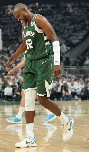 Milwaukee Bucks forward Khris Middleton limps during the first half of their playoff game against the Indiana Pacers.