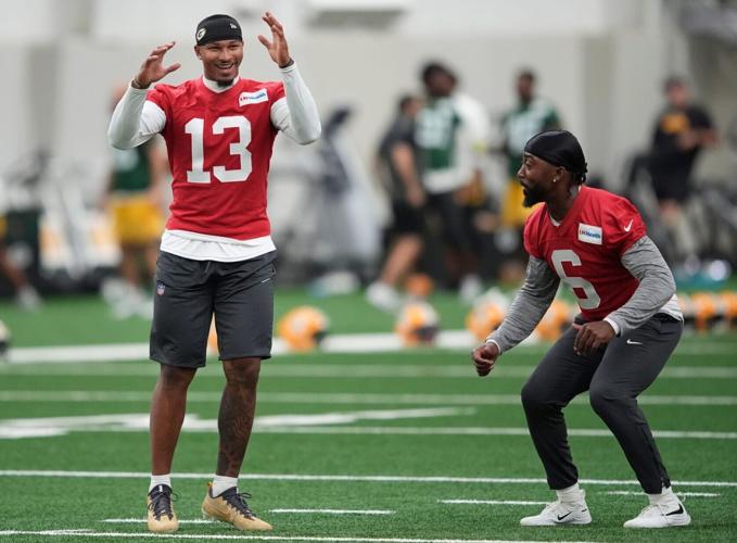 Green Bay Packers Kyron Drones and Tyrod Taylor