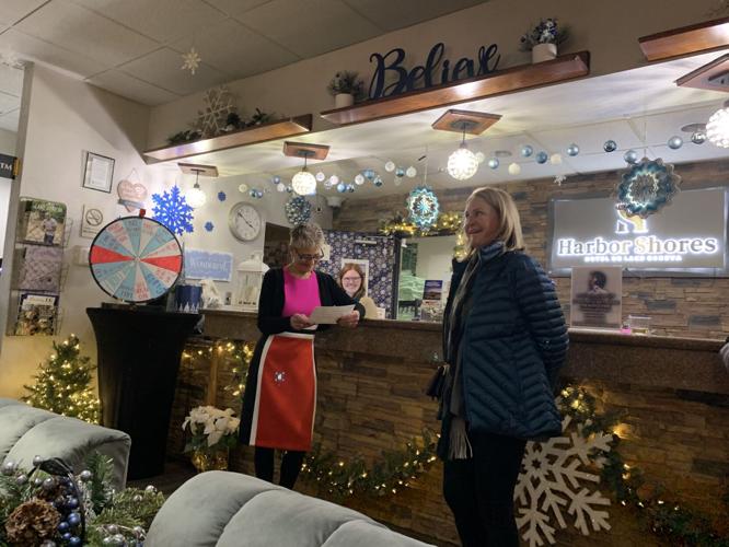 Diana Thompson is surprised to learn that she is the one millionth guest at Harbor Shores on Lake Geneva