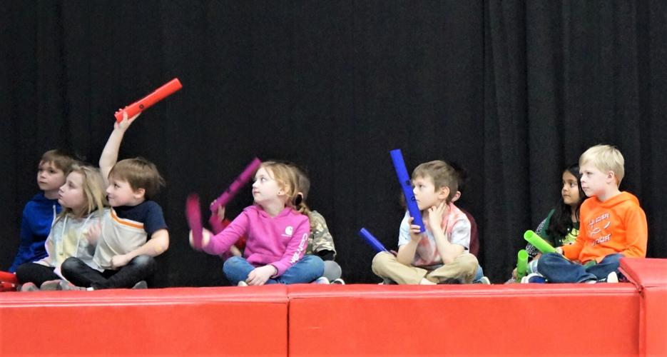 Fontana Elementary School first-graders play boomwhacker tuned percussion pipes at the school's March 9 concert