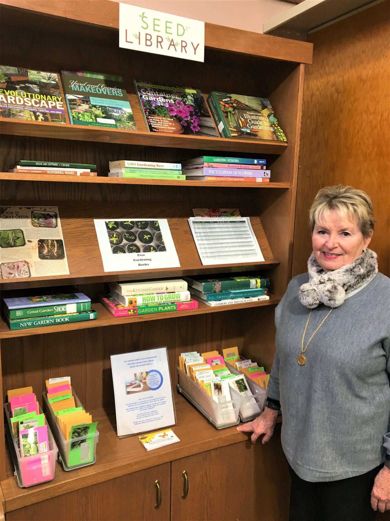 New "Seed Library" at Fontana Public Library, with Fontana Garden Club president Claudia Garber