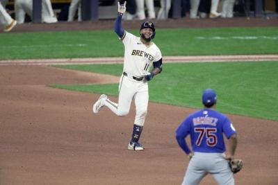 Brewers left fielder Jackson Chourio circles the bases after hitting a two-out, two-run home run to tie the game during the