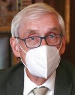Tony Evers headshot in a mask