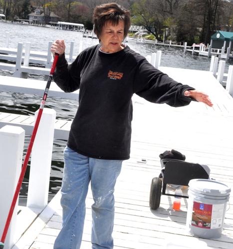Harbormaster Linda Frame points to some of the work that has been completed