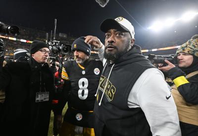 Jan 4, 2026; Pittsburgh, Pennsylvania, USA; Pittsburgh Steelers head coach Mike Tomlin and quarterback Aaron Rodgers (8) celebrate after defeating the Baltimore Ravens at Acrisure Stadium. Mandatory Credit: Barry Reeger-Imagn Images