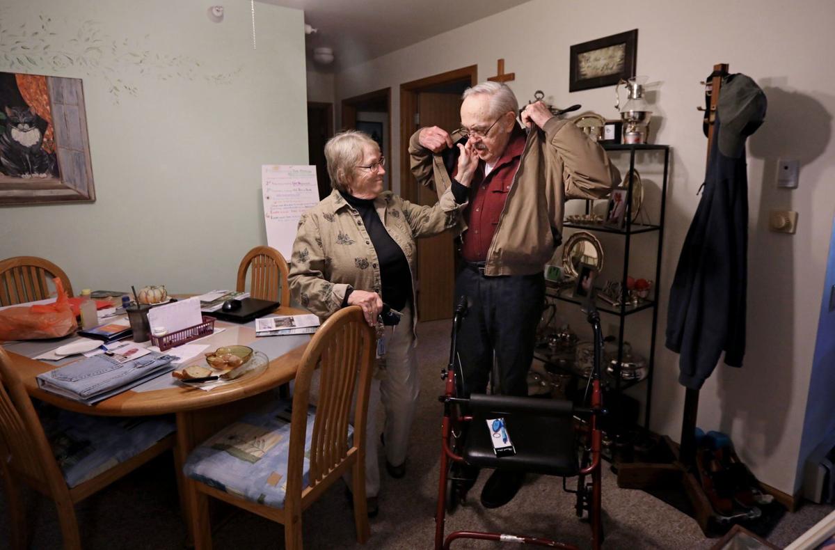 Mary and Don preparing to leave apartment