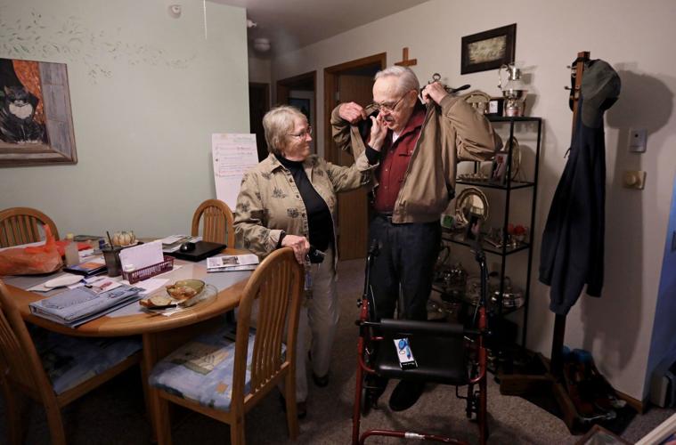 Mary and Don preparing to leave apartment