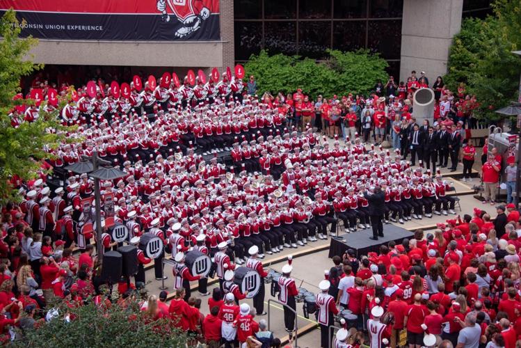 Members of the University of Wisconsin-Madison marching band perform during an event
