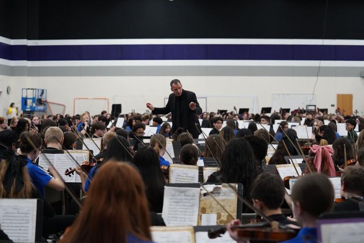 James Mick conducts KUSD students at annual orchestra festival