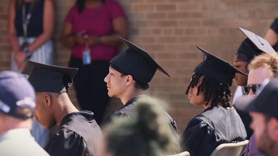 Graduates listening to remarks