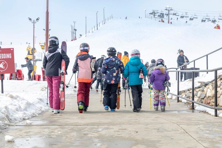 Family and Friends Heading to Ski at Wilmot Mountain