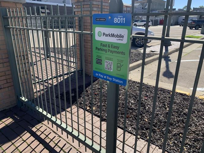 Parking Sign on Fence