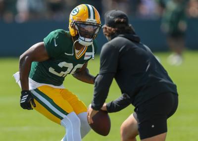 Green Bay Packers cornerback Kamal Hadden (36) runs through a drill during practice on Monday, Aug. 3, 2026, at Ray Nitschke