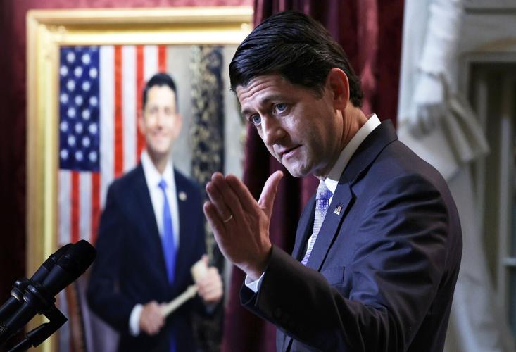 Former U.S. Speaker of the House and former Rep. Paul Ryan speaks next to a portrait of himself during a portrait unveiling ceremony in Statuary Hall at the U.S. Capitol on May 17, 2023, in Washington, DC. Ryan served as the 54th Speaker of the House fr...