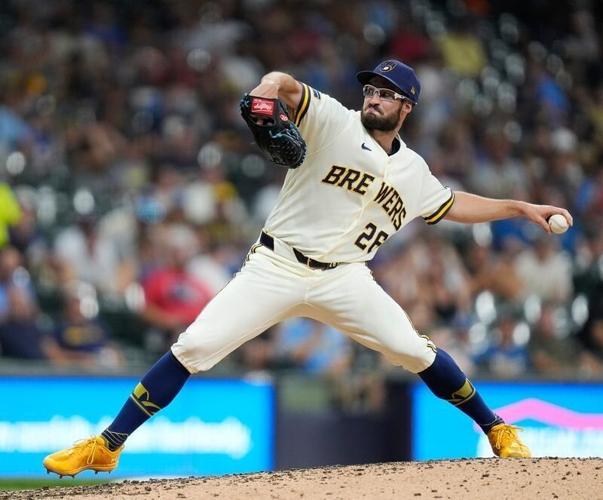 Milwaukee Brewers pitcher Aaron Ashby throws against the Cincinnati Reds.