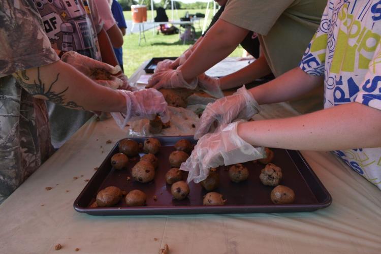 Students prepare cookies for solar oven