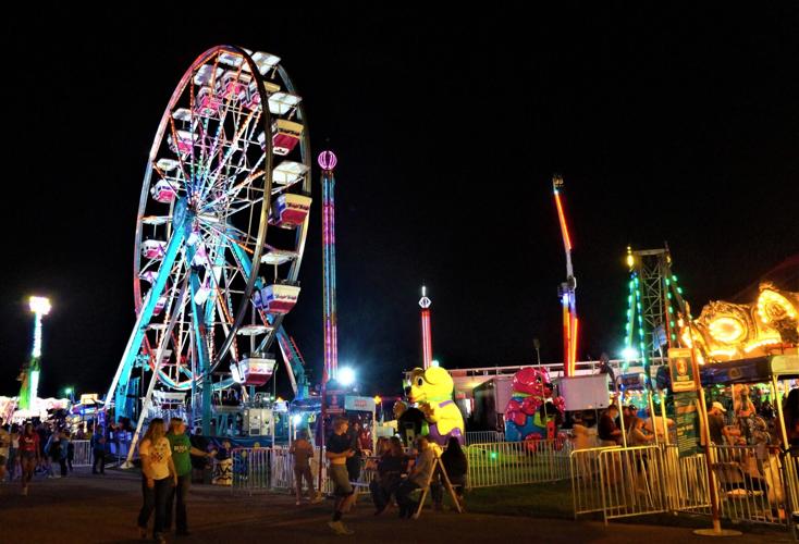 Walworth County Fair: The colorful carnival midway lights up the night sky at the fairgrounds