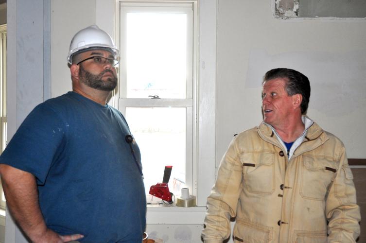 James Clendening, Nikao Group employee, left and Charles Manusos, president of Nikao Group